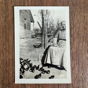 Antique Vintage Snapshot Photograph of‎ Woman sitting outside with baby chicks